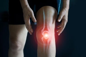 closeup image of young adult male knees