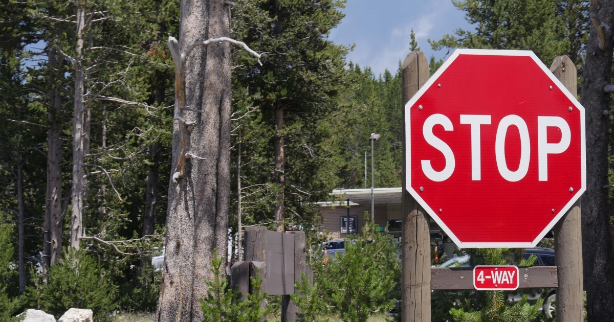 stop sign at four-way intersection