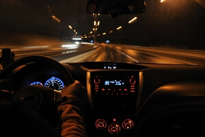 driving at night on a monotonous highway