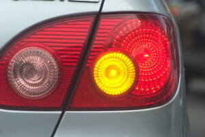 stock image of the back turn sign flashing on a car