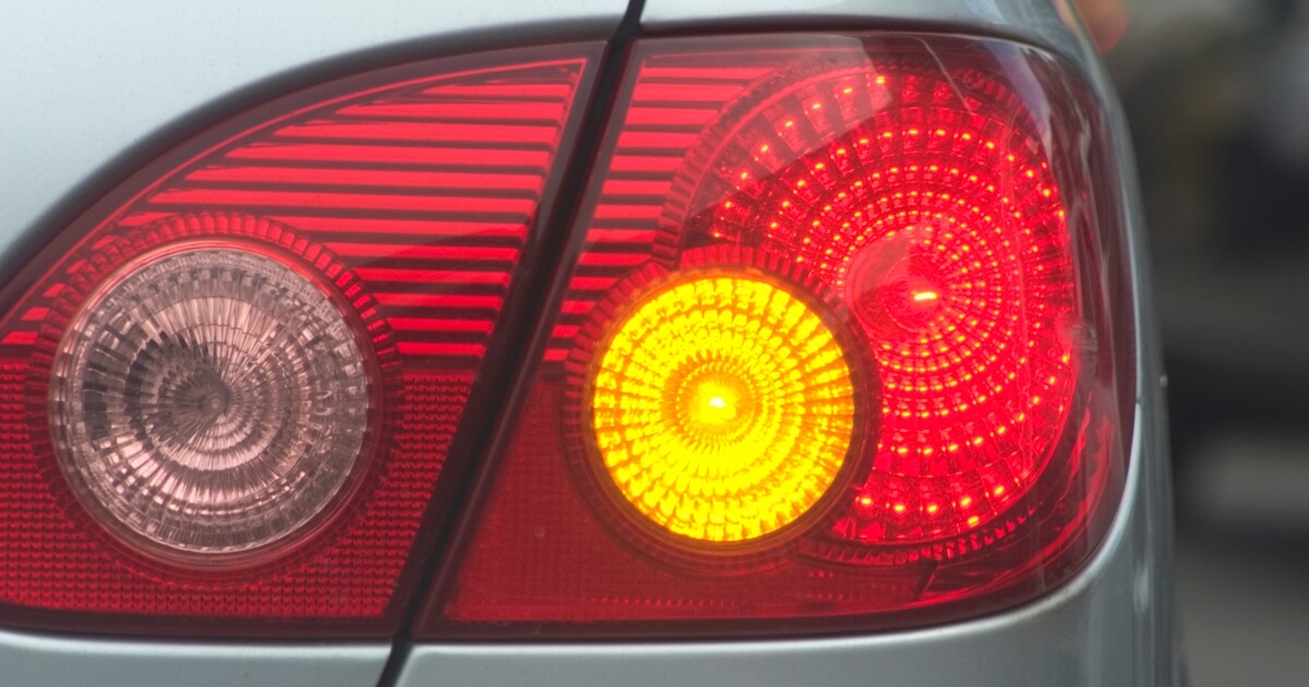 stock image of the back turn sign flashing on a car