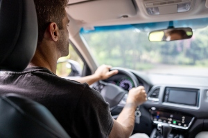 A driver navigating the road.