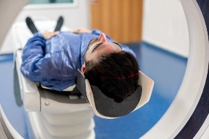 A person getting brain scan in a hospital.