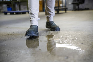 stepping on a puddle in a warehouse